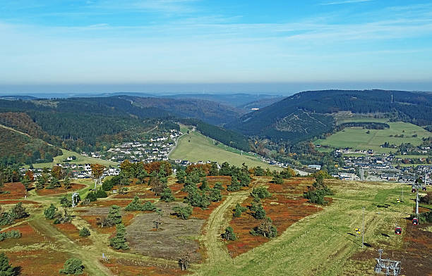 Willingen in the Sauerland region View from the mount Ettelsberg above Willingen in the German Sauerland region winterberg photos stock pictures, royalty-free photos & images