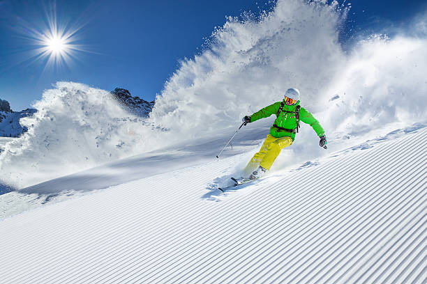 istock Skier skiing downhill in high mountains 496770166