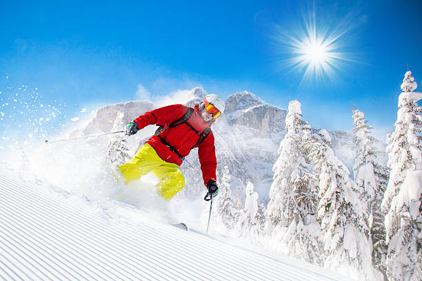 istock Skier skiing downhill in high mountains 496770322