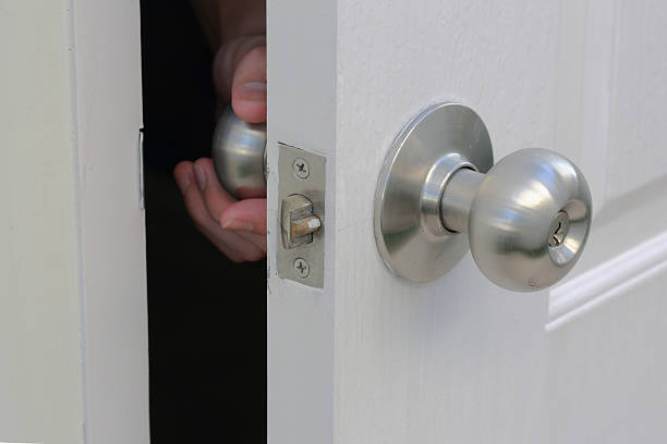 istock Hand are opened doorknob from the inside home 496772310