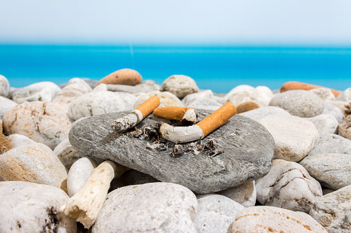 Cigarette butts on the beach
