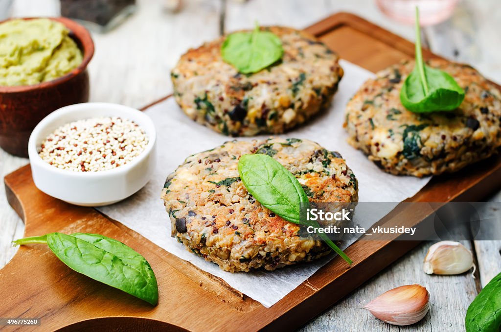 vegan quinoa eggplant spinach chickpeas Burger vegan quinoa eggplant spinach chickpeas Burger. toning. selective focus Burger Stock Photo