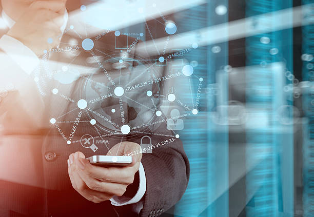 istock Double exposure of success businessman using smart phone 496776316