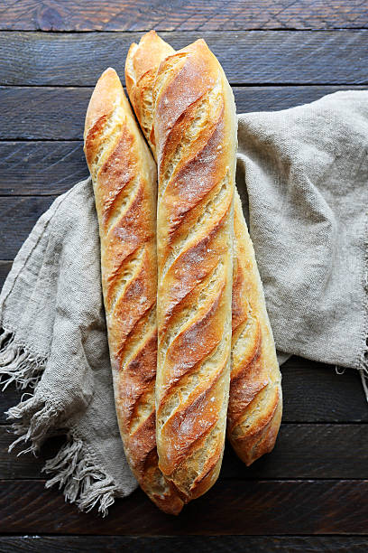 istock fresh french baguette on napkin 496776582