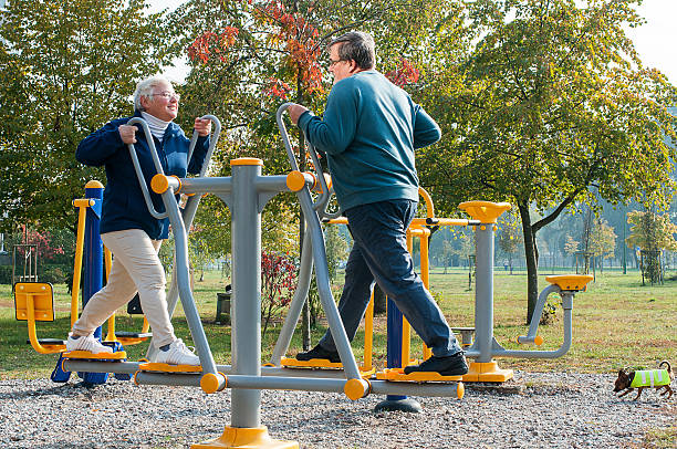 Active mature couple doing fitness stock photo