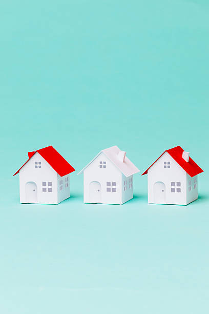 istock Three little paper house 496777660
