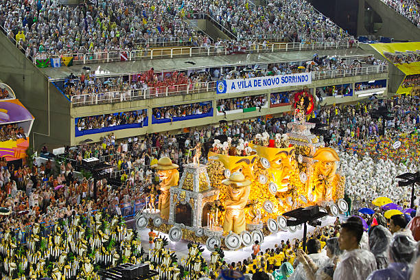 Samba school presentation in Sambodrome, Rio de Janeiro carnival Rio de Janeiro, Brazil- February 16, 2015: Samba school Mocidade Independente de Padre Miguel in his presentation show at Sambodrome, Rio de Janeiro carnival. This is one of the most waited big event in town and attracts thousands of tourists from all over the world. The parade is happenning in two consecutive days and the samba schools are always trying their best to impress the judges. samba dancing stock pictures, royalty-free photos & images