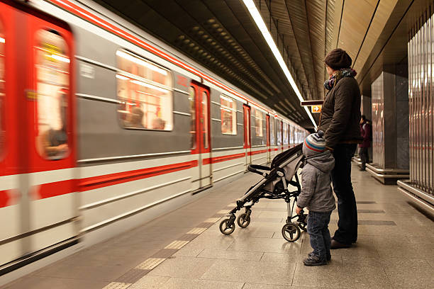 istock Family looking at train 496778938
