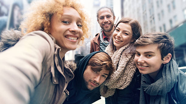 istock Group of friends making selfies 496778948