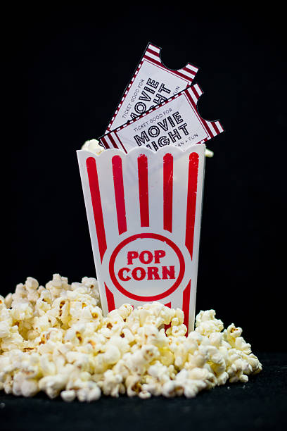 istock Movie night full popcorn tickets 496778966