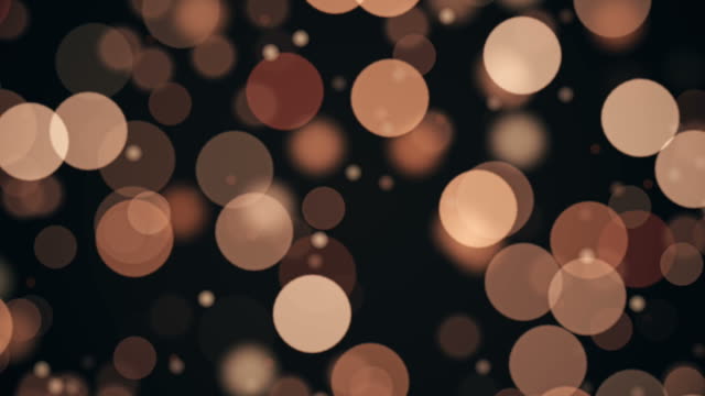 Particles floating in slow motion. Out of focus technique for a better visual effect.