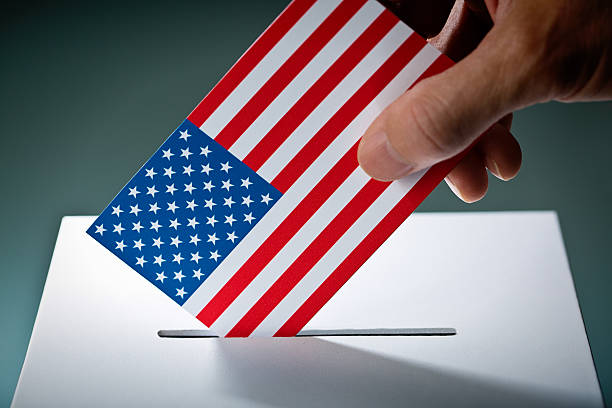 istock U.S. Election Voter Voting Ballot Over Ballot Box 496789782