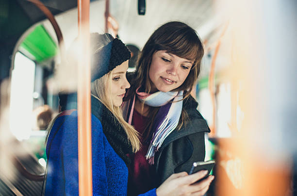 istock Teenagers with smartphone on the bus 496793704