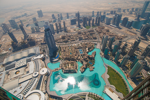 Dubai, UAE - March 30, 2015:  The Burj Khalifa, tallest building in the world. Aerial view of Downtown Dubai with man made skyscrapers from the tallest building in the world, Burj Khalifa, at 828m