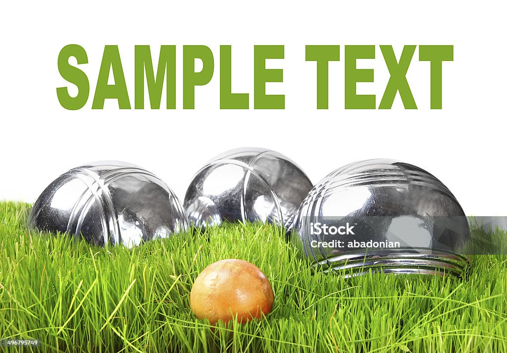 The bocce balls. The bocce balls on a green grass. Bocce Ball Stock Photo