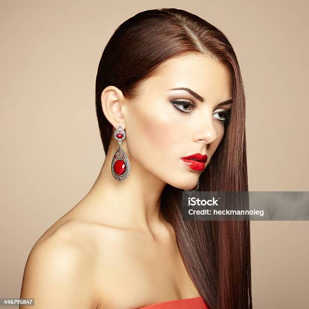 Portrait Of Beautiful Brunette Woman With Earring Perfect Makeu Stock Photo - Download Image Now