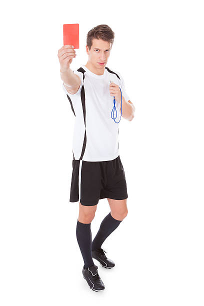 istock Young Soccer Referee Showing Red Card 496796425
