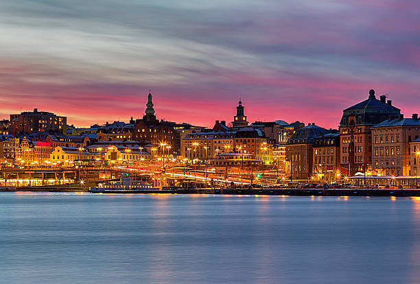 Stockholm city night image with pink sunset. Beautiful pink sunset over Slussen in Stockholm city. sodermalm photos stock pictures, royalty-free photos & images