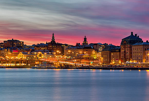 estocolmo de cidade noite imagens com rosa pôr do sol. - stockholm sweden sea winter imagens e fotografias de stock