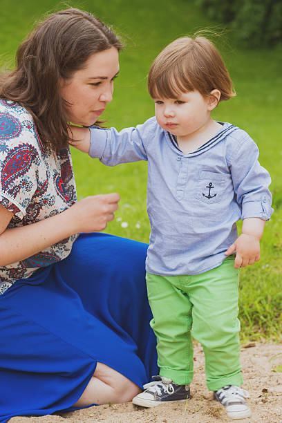 istock mother with son outdoor 496798224