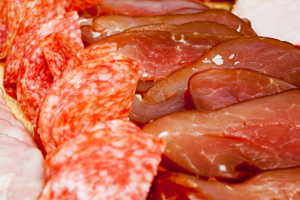 istock Salami sausage slices and ham 496798534