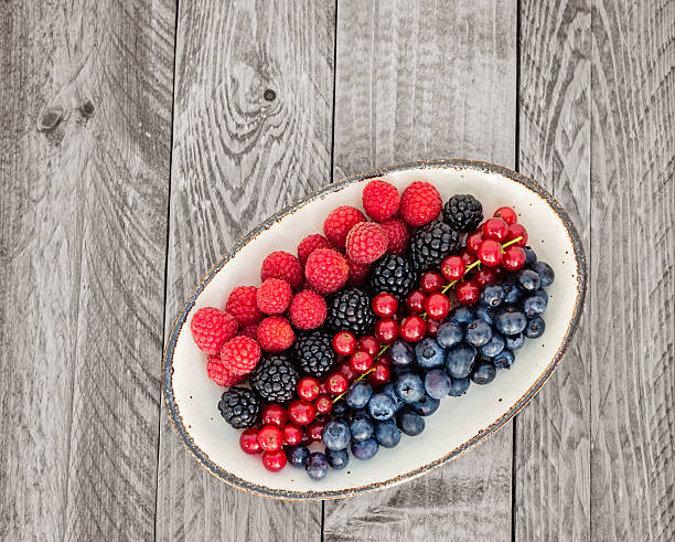istock Assortment of Berries on an Oval Plate 496799850