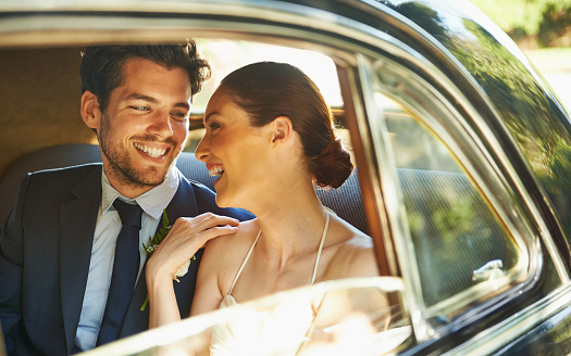 A handsome best man and bridesmaid enjoying a moment of laugther while leaving the wedding receptionhttp://195.154.178.81/DATA/i_collage/pu/shoots/784347.jpg