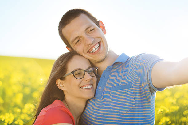 istock Couple in love in field 496800527