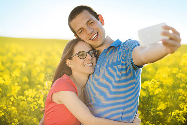 istock Couple in love in field 496800533