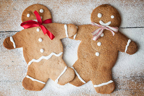 istock Gingerbread man on wood, suitable snow and winter 496800798