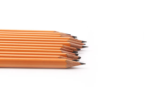 istock Black slate pencils isolated on a white background 496802264