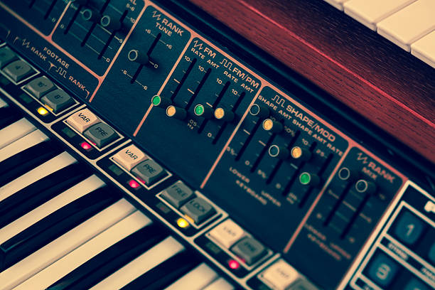 Vintage synthesizer keyboard musical instrument Abstract toned image of vintage synthesizer keyboard musical instrument. Selective focus and tilt. synthesizer stock pictures, royalty-free photos & images