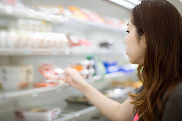 istock Japanese woman doing grocery shopping 496803652