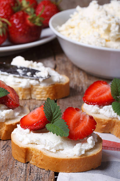 istock cooking sandwiches with soft cheese and fresh strawberries 496813591