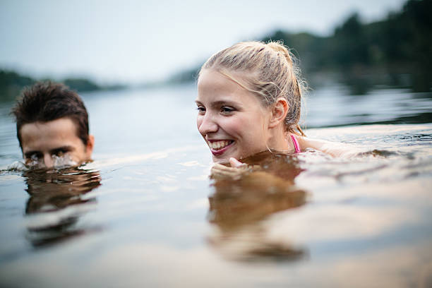 istock Two young teens at the lake 496814787