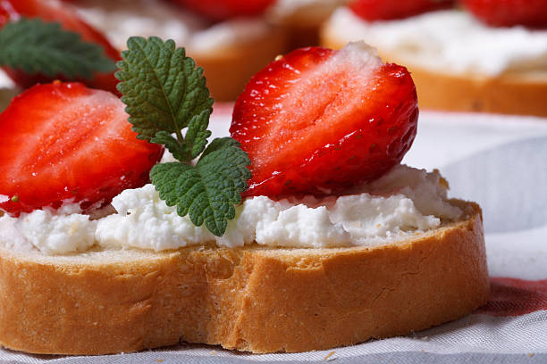 istock sandwich with strawberries, cheese and mint macro 496815981
