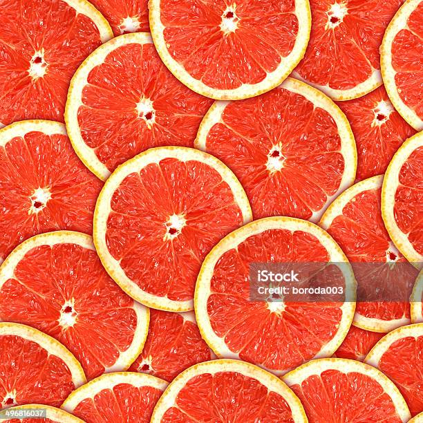 Seamless Pattern Of Red Grapefruit Slices Stock Photo - Download Image Now - Grapefruit, Backgrounds, Abstract
