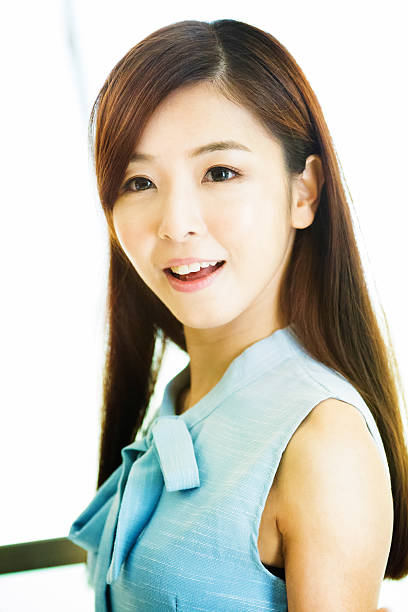 istock Smiling young Chinese woman 496817619