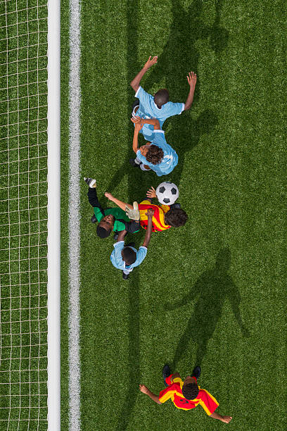 istock Young Footballers In Action 496817723