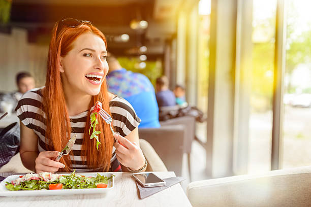 istock lifestyle, woman in restaurant 496817935