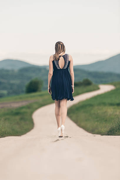 istock Young woman in beautiful gown 496821002
