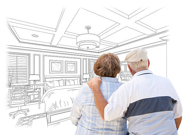 istock Senior Couple Looking Over Custom Bedroom Design Drawing 496825582