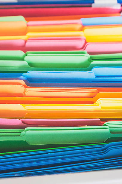 Colorful file folders in file cabinet drawer