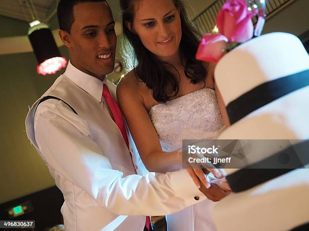 Couple Cutting Wedding Cake Stock Photo - Download Image Now - Adult, African Ethnicity, Celebration