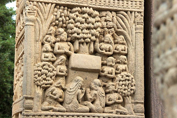 Buddhist Life on Pillar Scene of Buddhist life carved on stone pillar at Stupa in Sanchi, near Bhopal, Madhya Pradesh, India, Asia stupa stock pictures, royalty-free photos & images