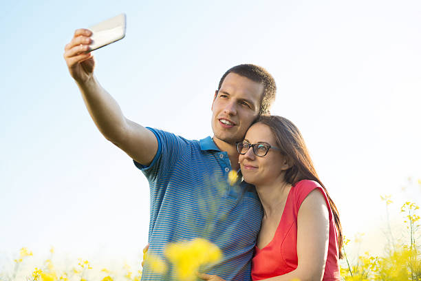 istock Couple in love in field 496832595