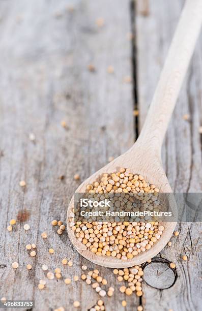 Mustard Seeds On A Cooking Spoon Stock Photo - Download Image Now - Seed, Yellow Mustard, Appetizer