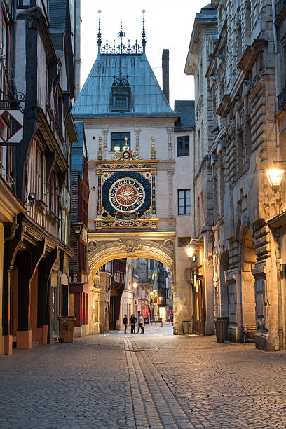 Famous Big Clock Famous Gros Horloge street with astronomical clock tower, Rouen facade store old built structure stock pictures, royalty-free photos & images