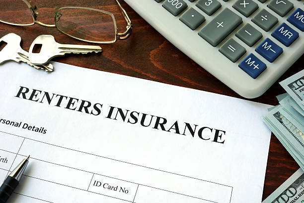 istock Renters insurance  form and dollars on the table. 496847668