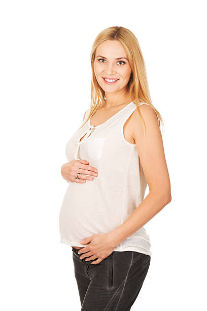 istock Happy pregnant woman looking at camera 496847746